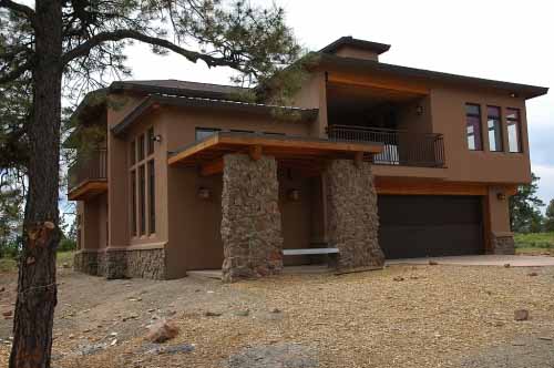 Rear view during construction of a high-performance home designed by Living Systems in Pagosa Springs, CO